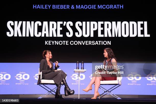 Maggie McGrath interviews Hailey Bieber at the 2022 Forbes 30 Under 30 Summit at Detroit Opera House on October 03, 2022 in Detroit, Michigan.