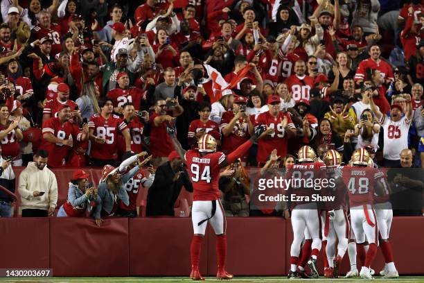 Safety Talanoa Hufanga of the San Francisco 49ers celebrates his touchdown with teammates against the Los Angeles Rams during the fourth quarter at...