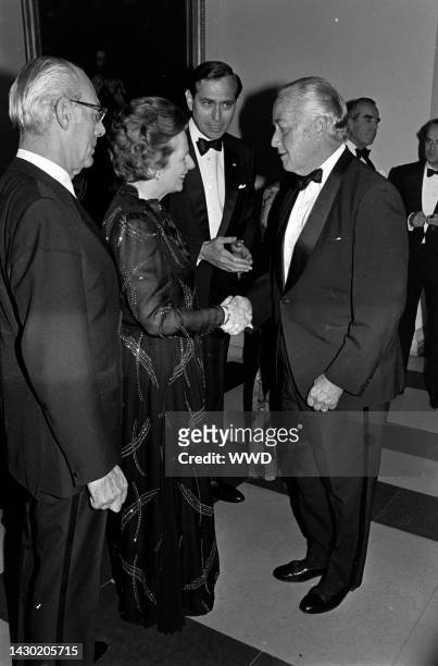 Margaret Thatcher attends a party at the British embassy in Washington, D.C., on October 3, 1983.