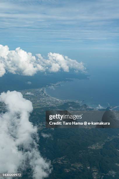 rainy clouds over kamogawa city in chiba of japan aerial view from airplane - chiba city imagens e fotografias de stock