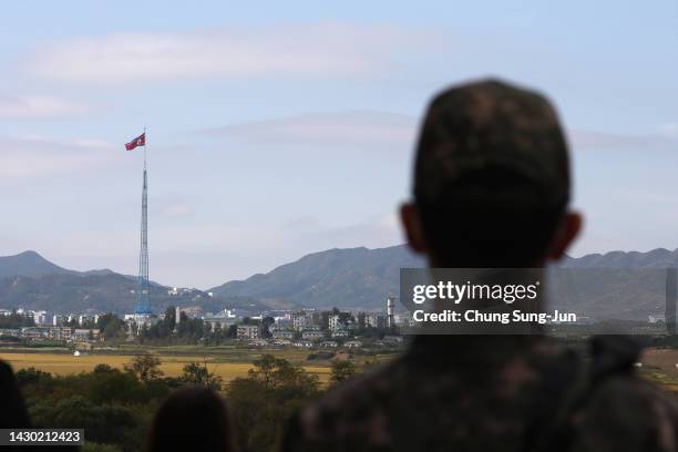 South Korean soldier look at North Korea in the truce village of Panmunjom inside the demilitarized zone separating South and North Korea on October...