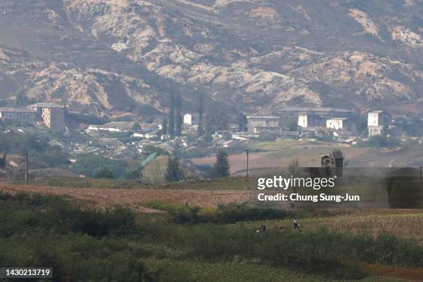 North Korea's propaganda village of Gijungdong is seen from a South Korea's observation post inside the demilitarized zone separating South and North...
