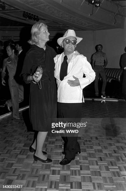Guest dances with Truman Capote during a party at Studio 54 in New York City on September 12, 1978.