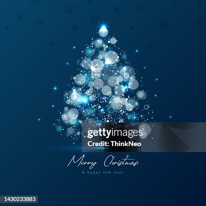 Magic Xmas tree made from blue lights on dark background Magic Xmas tree made from blue lights on dark background