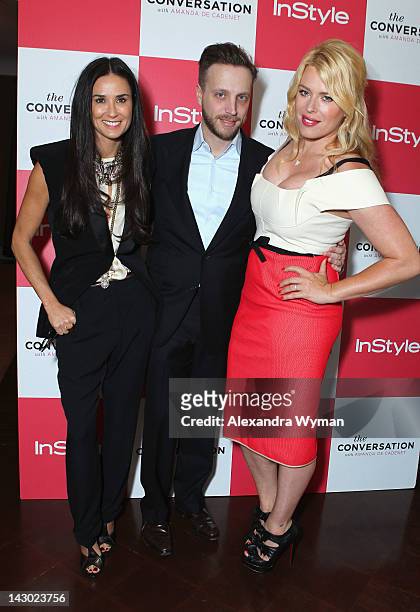 Actress Demi Moore, Editor of InStyle Ariel Foxman and host/photographer Amanda de Cadenet arrive at InStyle's celebration and the launch of 'The...