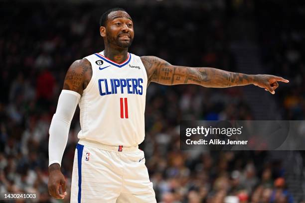 John Wall of the Los Angeles Clippers points during the first half of the preseason game against the Portland Trail Blazers at Climate Pledge Arena...