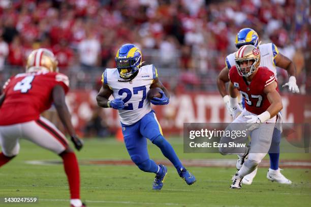 Darrell Henderson Jr. #27 of the Los Angeles Rams runs with the ball against the San Francisco 49ers at Levi's Stadium on October 03, 2022 in Santa...