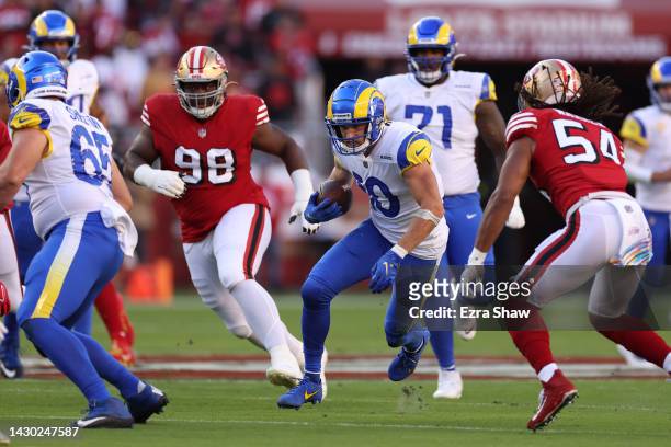 Cooper Kupp of the Los Angeles Rams runs with the ball against the San Francisco 49ers at Levi's Stadium on October 03, 2022 in Santa Clara,...