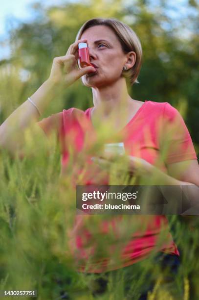 asthmatic inhaler - ambrosia stock pictures, royalty-free photos & images