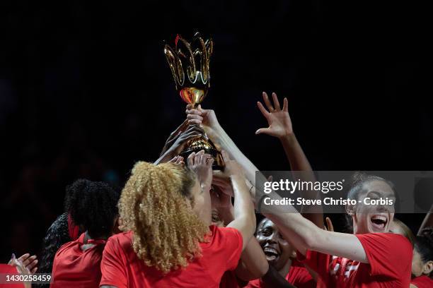 Team United States and captain Breanna Stewart hold up the trophy during the 2022 FIBA Women's Basketball World Cup Final match between USA and China...