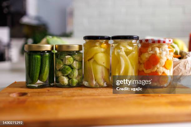 jars with pickled vegetables - pickled stock pictures, royalty-free photos & images