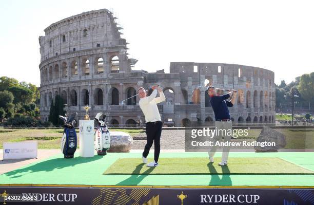 Team Captains Luke Donald of England and Zach Johnson of The United States pose for a photograph with the Ryder Cup Trophy at the Colosseum during...