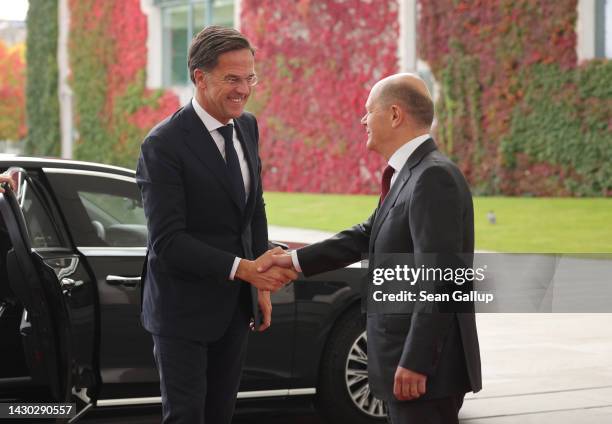 German Chancellor Olaf Scholz greets Dutch Prime Minister Mark Rutte upon the arrival of the Dutch delegation for a meeting of the German-Dutch...