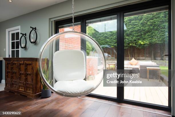 property home interiors - bubble chair stock-fotos und bilder