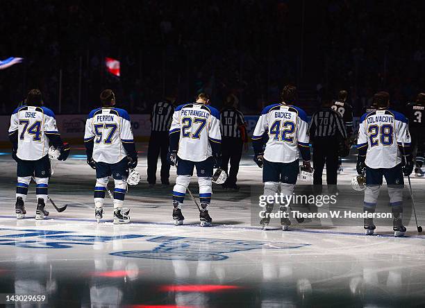 Oshie, David Perron, Alex Pietrangelo, David Backes and Carlo Colaiacovo of the St Louis Blues stands for the National Anthem before start of play...