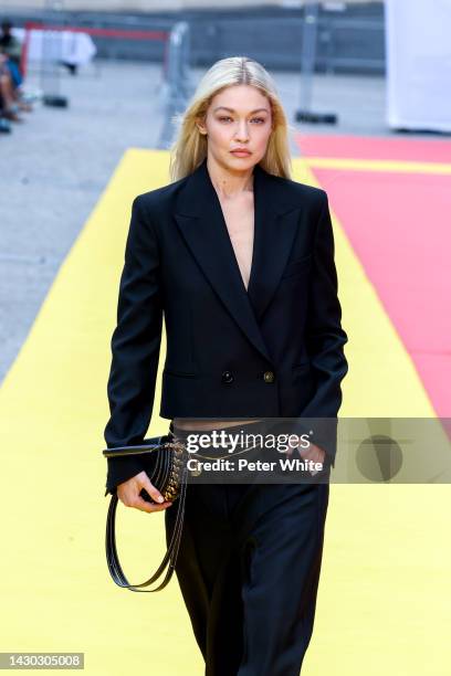 Gigi Hadid walks the runway during the Stella McCartney Womenswear Spring/Summer 2023 show as part of Paris Fashion Week on October 03, 2022 in...