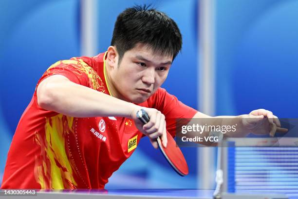 Fan Zhendong of China competes against Tancharoen Sarayut of Thailand during the Men's Group match between China and Thailand on Day 5 of 2022 ITTF...
