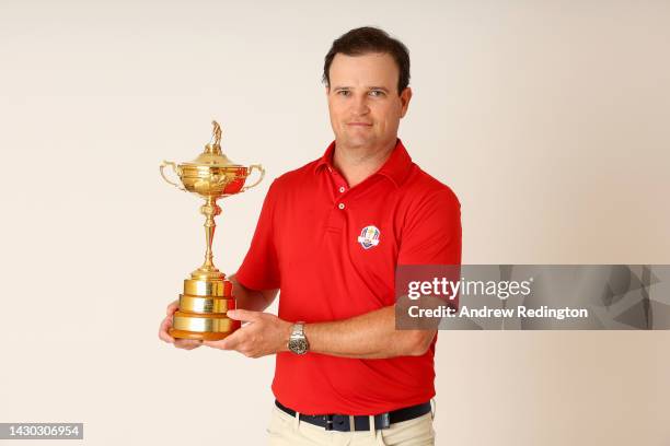 Zach Johnson of The United States poses for a photograph with the Ryder Cup Trophy during the Ryder Cup 2023 Year to Go Media Event on October 04,...