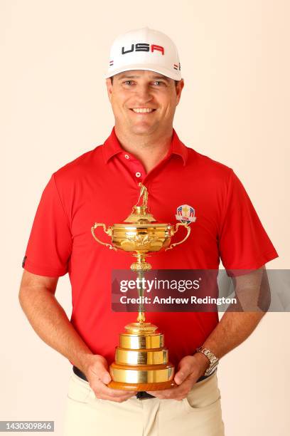 Zach Johnson of The United States poses for a photograph with the Ryder Cup Trophy during the Ryder Cup 2023 Year to Go Media Event on October 04,...