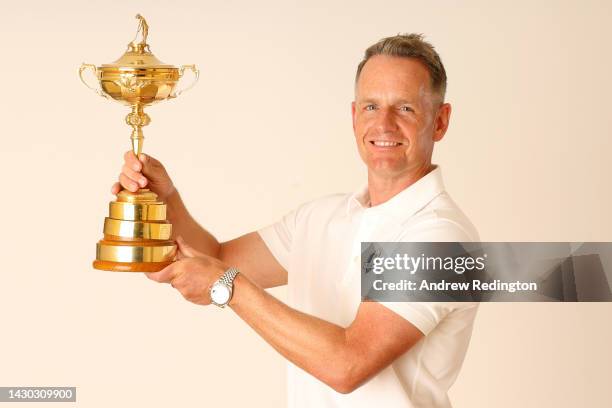 Luke Donald of England poses for a photograph with the Ryder Cup Trophy during the Ryder Cup 2023 Year to Go Media Event on October 04, 2022 in Rome,...