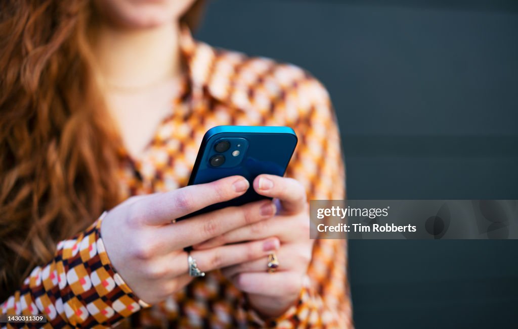 Close up of woman using smart phone