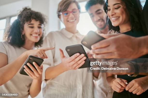 group check social media on smartphone, online teamwork conversation and tech marketing agency. young team share funny digital meme, happy people laugh together in office and read communication wifi - employee mobile phone stock pictures, royalty-free photos & images