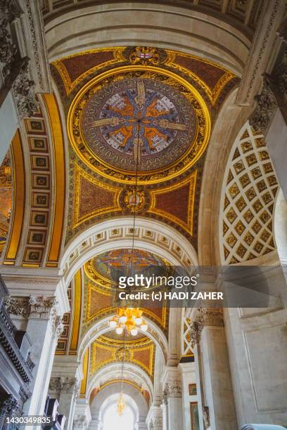 a view of the nave at st paul's cathedral in london | united kingdom - cathedral ceiling stock pictures, royalty-free photos & images