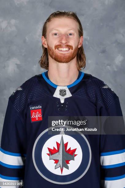 Kyle Connor of the Winnipeg Jets poses for his official headshot for the 2022-2023 season on September 21, 2022 at Bell MTS Iceplex in Winnipeg,...