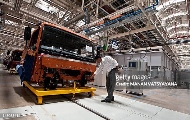 Bharat Benz trucks are seen on the assembly line at the Daimler India Commercial Vehicles Plant at Oragadam in Chennai on April 18, 2012. The German...