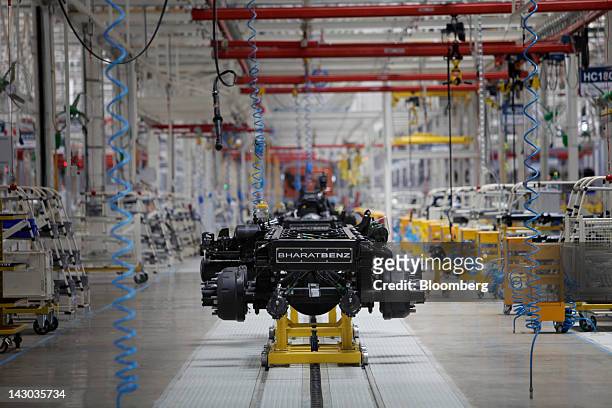 BharatBenz chassis is lined up at an assembly line at the new Daimler AG truck factory in Kancheepuram, India, on Wednesday, April 18, 2012. Daimler...