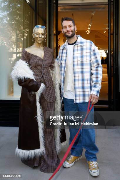 Doja Cat is pictured with Simon Porte Jacquemus if front of the Jacquemus store as part of the Paris Fashion Week - Womenswear Spring/Summer 2023 -...