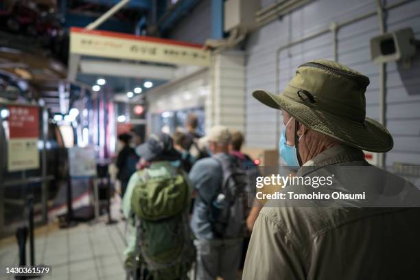 Tourist from the United States wait to ride a cable car on October 04, 2022 in Hakone, Japan. Japan's Prime Minister Fumio Kishida unveiled a...