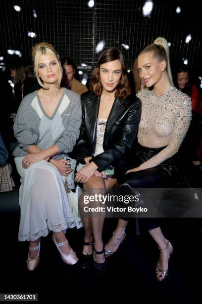 Pixie Geldof, Alexa Chung and Poppy Delevingne attend the Miu Miu Womenswear S/S 2023 show as part of Paris Fashion Week at Palais d'Iena on October...