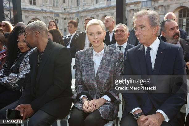 Princess Charlene of Monaco and Bernard Arnault attend the Louis Vuitton Womenswear Spring/Summer 2023 show as part of Paris Fashion Week on October...