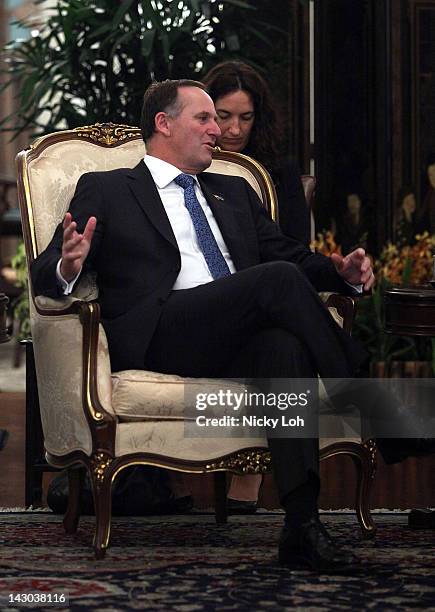 New Zealand Prime Minister John Key speaks to Singapore Prime Minister Lee Hsien Loong at the Istana on April 18, 2012 in Singapore. New Zealand's...