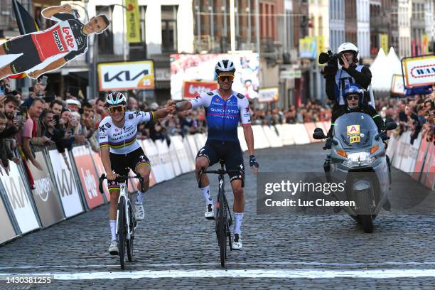 Remco Evenepoel of Belgium and Iljo Keisse of Belgium and Team Quick-Step - Alpha Vinyl react at finish line during the 35th Binche - Chimay - Binche...