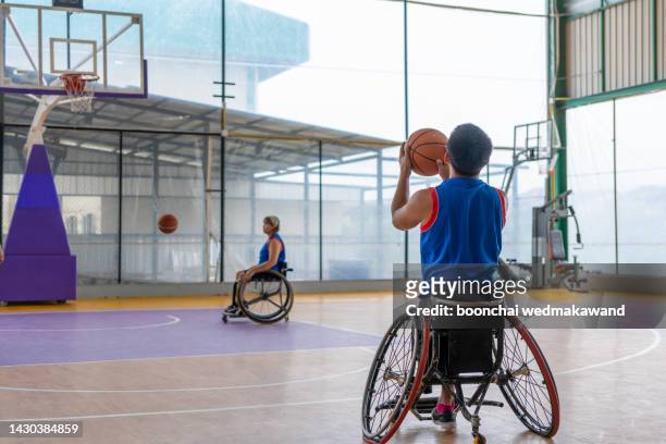 handicapped wheelchair basketball - rugby icon stock pictures, royalty-free photos & images