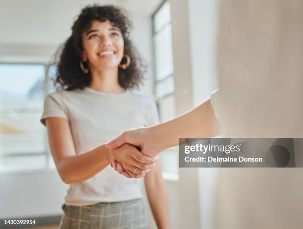 business women, handshake and partnership success in marketing meeting for b2b deal, growth sales crm and collaboration. smile, happy or teamwork with thank you or welcome gesture in brazilian office - new imagens e fotografias de stock