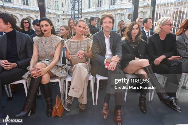 Deepika Padukone, Alicia Vikander, Antoine Arnault and Ana de Armas attend the Louis Vuitton Womenswear Spring/Summer 2023 show as part of Paris...