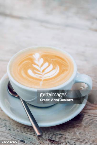 latte or cappuccino coffee in cafe - filterkaffee stock-fotos und bilder
