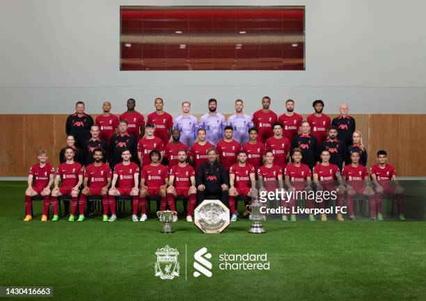 The Liverpool FC First Team Squad pose for their official squad photo at AXA Training Centre on October 04, 2022 in Kirkby, England. Back Row, John...