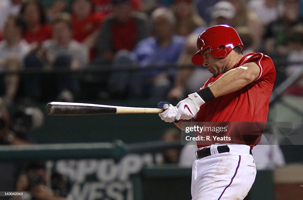 Seattle Rangers Michael Young of the Texas Rangers follows through against the... News ...