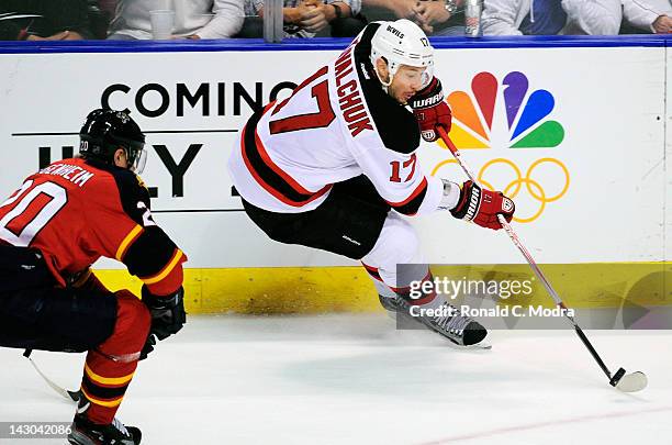 Ilya Kovalchuk of the New Jersey Devils skates with the puck against the Florida Panthers in Game Two of the Eastern Conference Quarterfinals during...