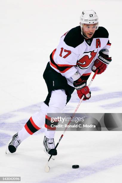 Ilya Kovalchuk of the New Jersey Devils skates with the puck against the Florida Panthers in Game Two of the Eastern Conference Quarterfinals during...