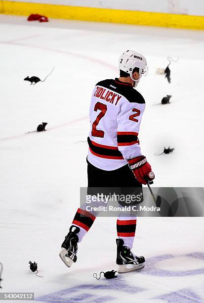 Marek Zidlicky of the New Jersey Devils skates around plastic rats in Game Two of the Eastern Conference Quarterfinals against the Florida Panthers...
