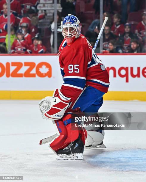 Kevin Poulin of the Montreal Canadiens tends net during the warm-ups prior to a preseason game against the Toronto Maple Leafs at Centre Bell on...