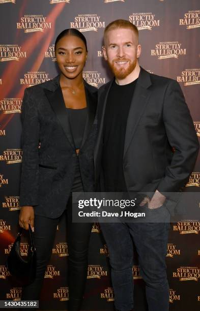 Chyna Mills and Neil Jones attend the "Strictly Ballroom" press night at Churchill Theatre on October 04, 2022 in Bromley, England.