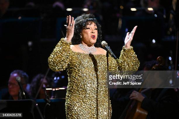 Dame Shirley Bassey performs on stage accompanied by The Royal Philharmonic Concert Orchestra during The Sound of 007 in concert at The Royal Albert...