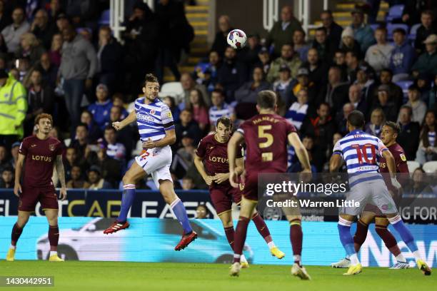 Andy Carroll of Reading heads the ball during the Sky Bet Championship between Reading and Norwich City at Select Car Leasing Stadium on October 04,...