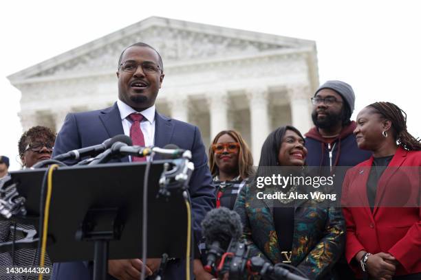 Lead counsel for the plaintiffs Deuel Ross speaks to members of the press as President and Director-Counsel of the NAACP Legal Defense Fund Janai...